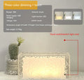 Geometric clear acrylic night lamp showing multi-colour LED illumination.