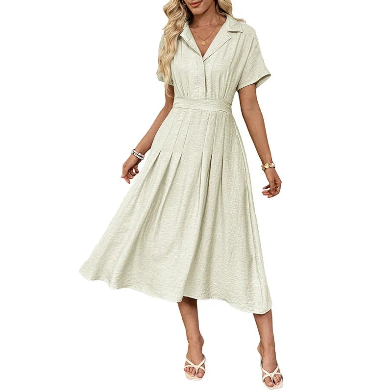 Light green shirt dress with lapel collar, waist tie, and side pockets