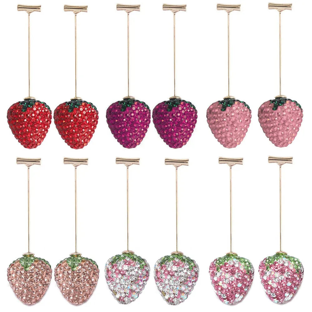 Red geometric strawberry-shaped dangle earrings with spot drill texture on zinc alloy.