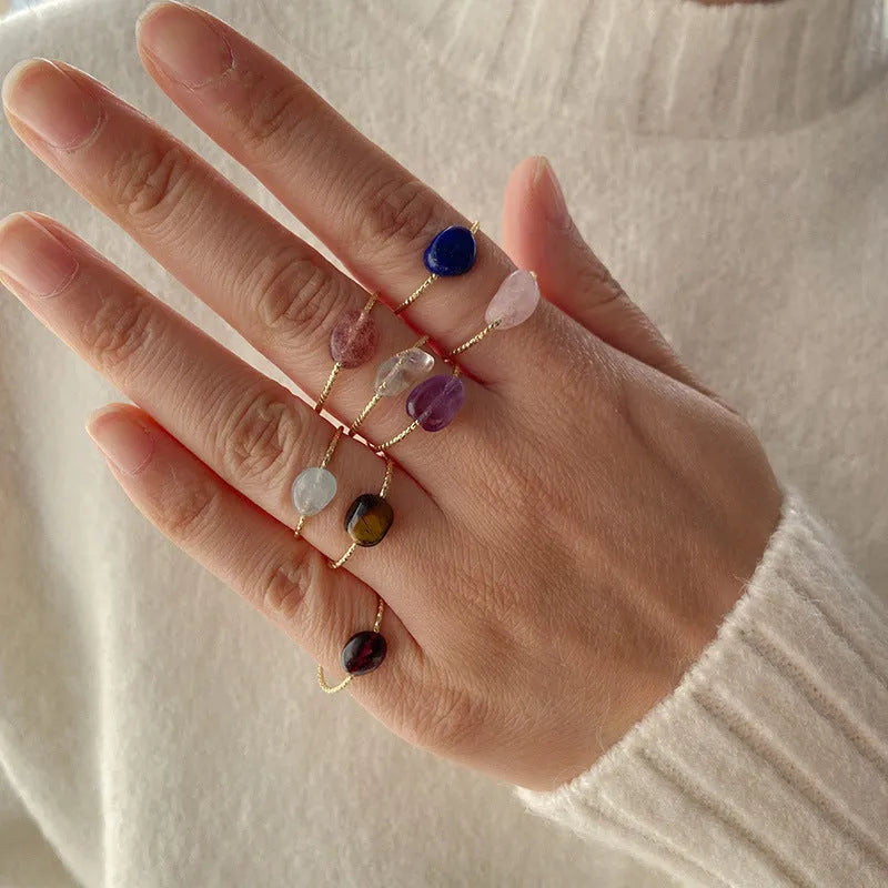 Women's original geometric agate ring in a selection of eight colours on a plain background.
