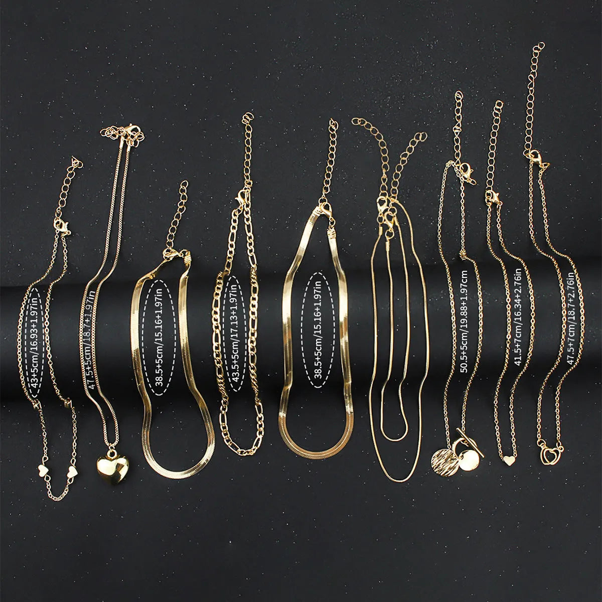 10-piece gold electroplated women's necklace set with simple alloy pendants on snake bone chains