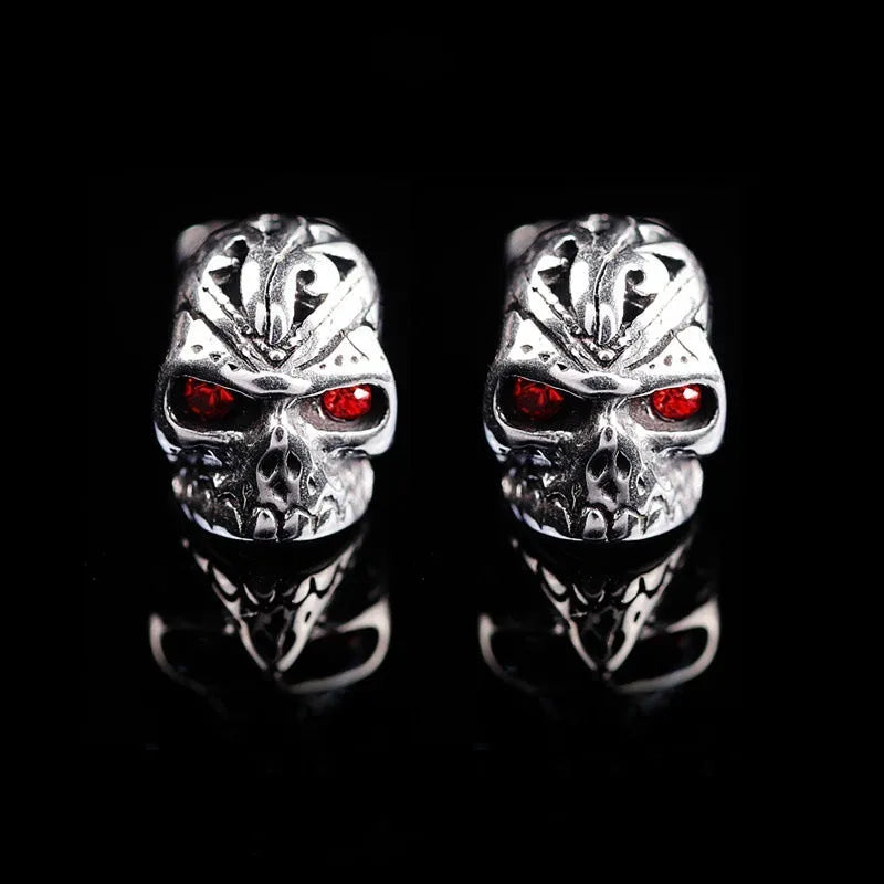 Retro skull stud earrings with red eye ghost head design and gemstone inlays on alloy base