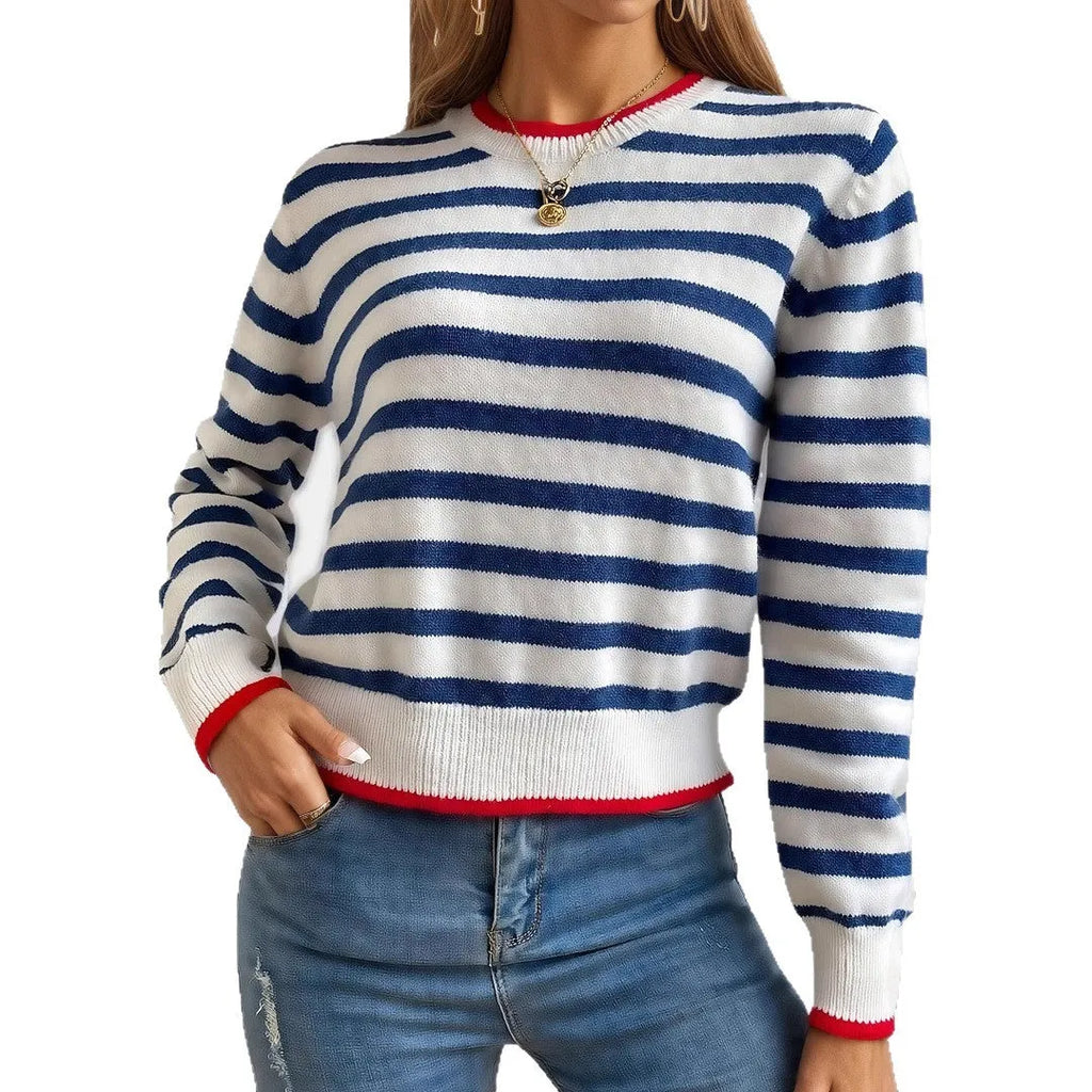 Sapphire blue loose-fit striped knitted pullover jumper with round neck and long sleeves.
