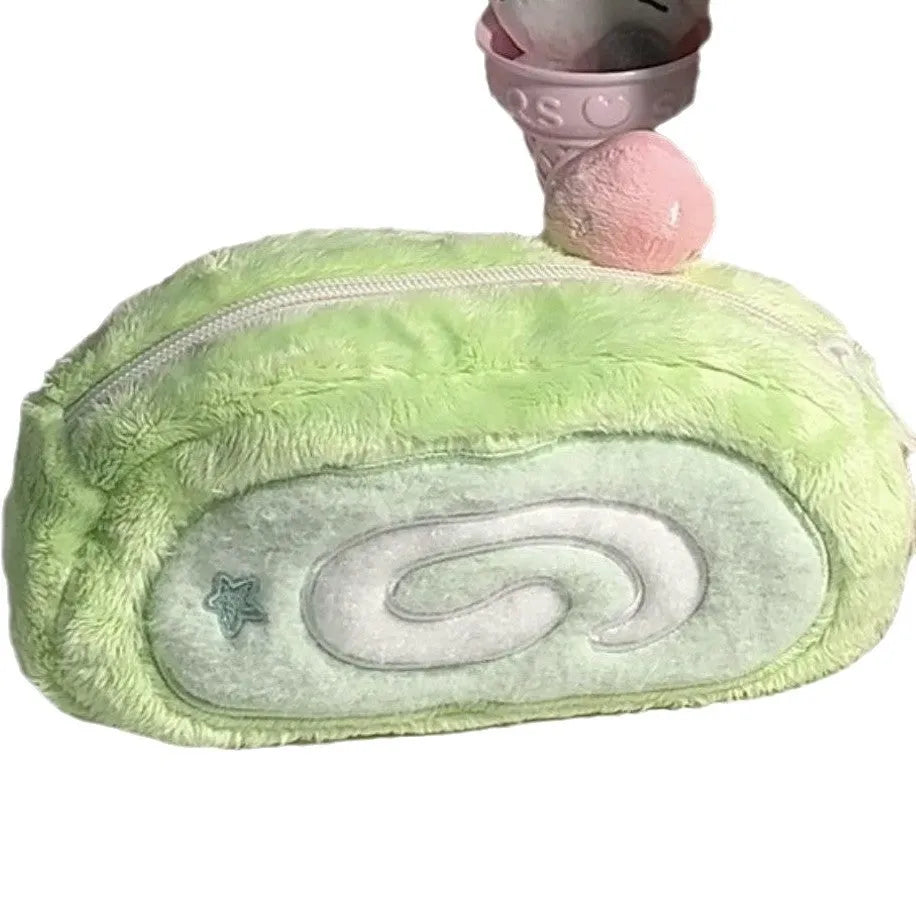 Korean style velvet pencil case designed like a swiss roll cake for stationery storage.