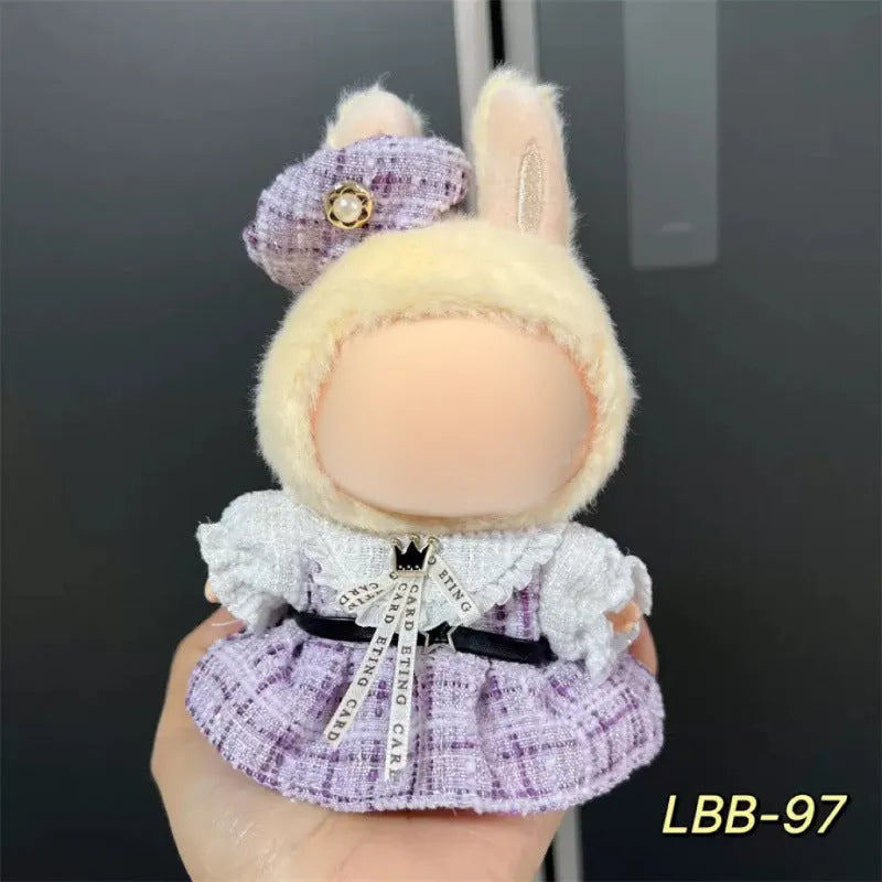 Plastic doll clothes costume for a 17cm tall vinyl figurine on a white background.