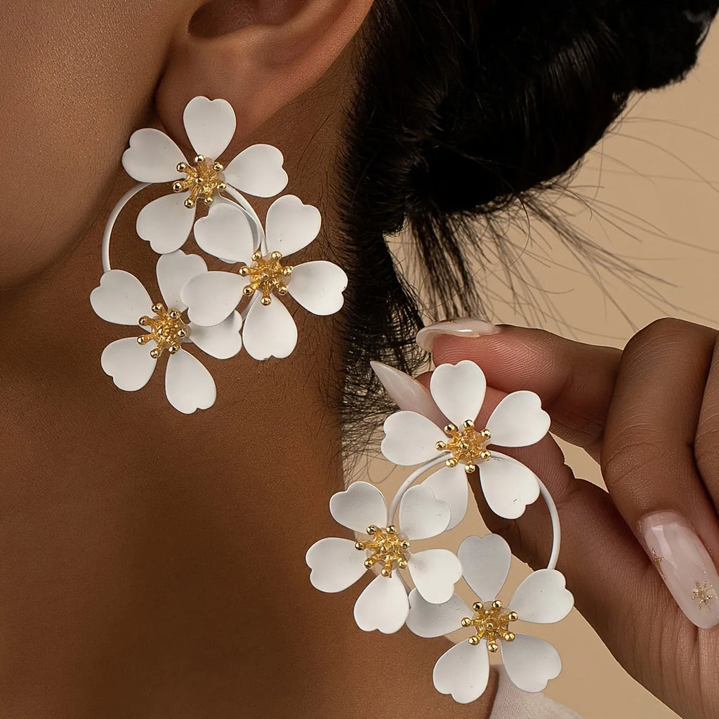 Retro flower earrings for women in black or white with iron construction and baking varnish finish