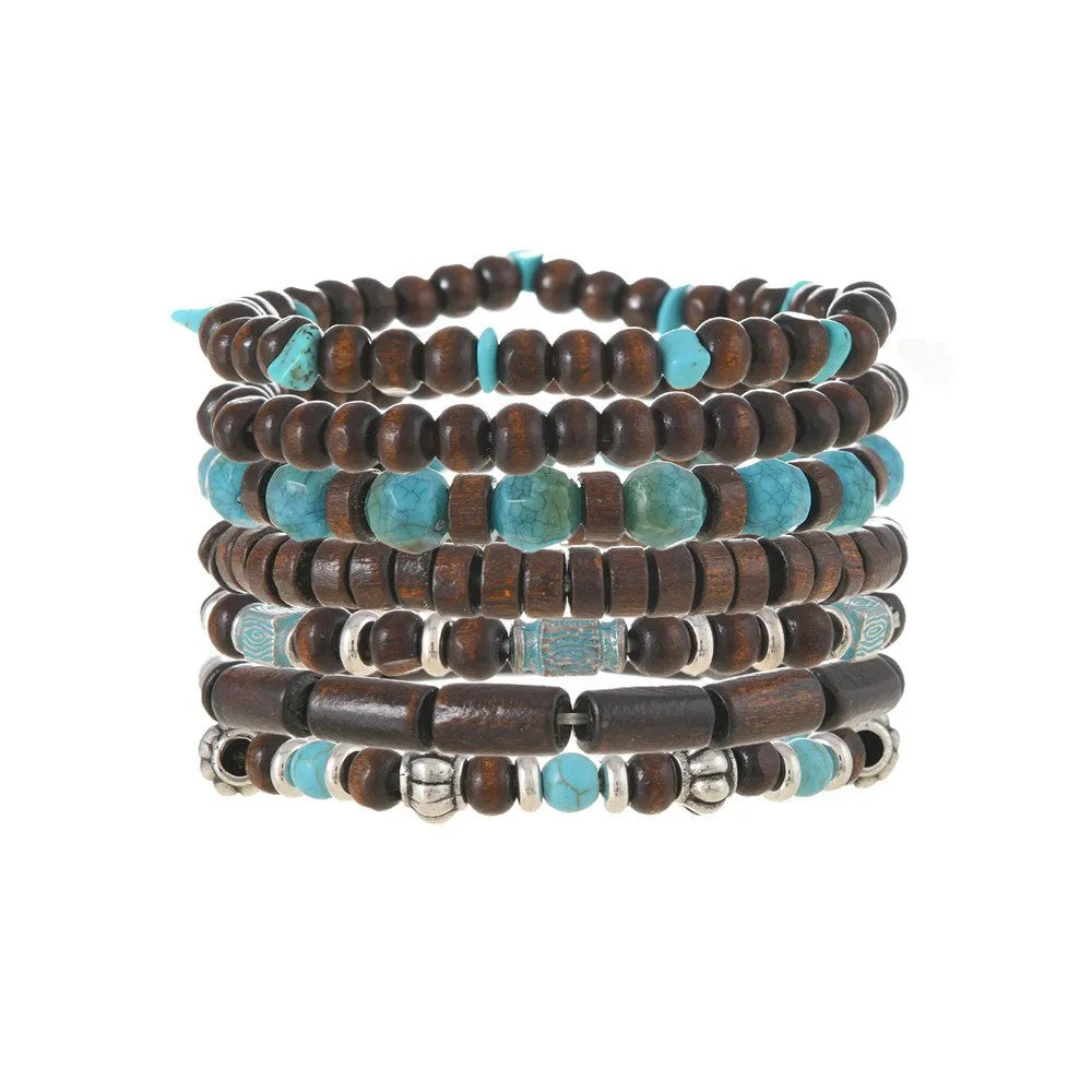 Set of seven multicolour retro bracelets with wooden beads and alloy details.
