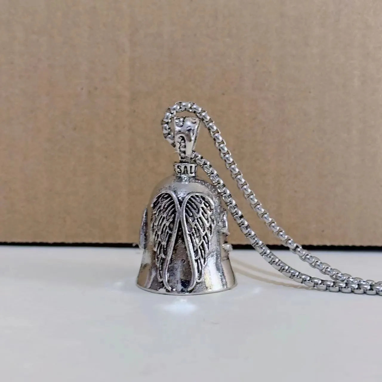 White vintage angel feather necklace and matching keychain set with electroplated alloy construction