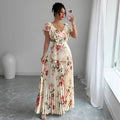Apricot floral print women's dress with V-neck, ruffled sleeves, and a high-waisted swing skirt.