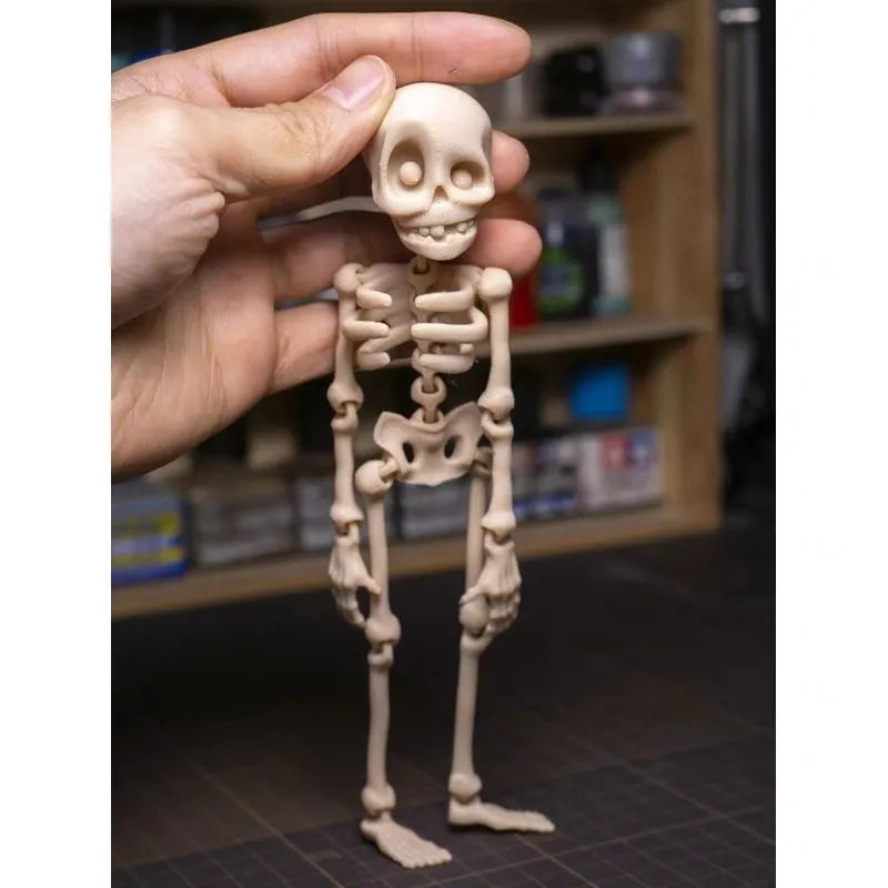 3D printed white skull refrigerator magnet Halloween ornament measuring 18cm tall.