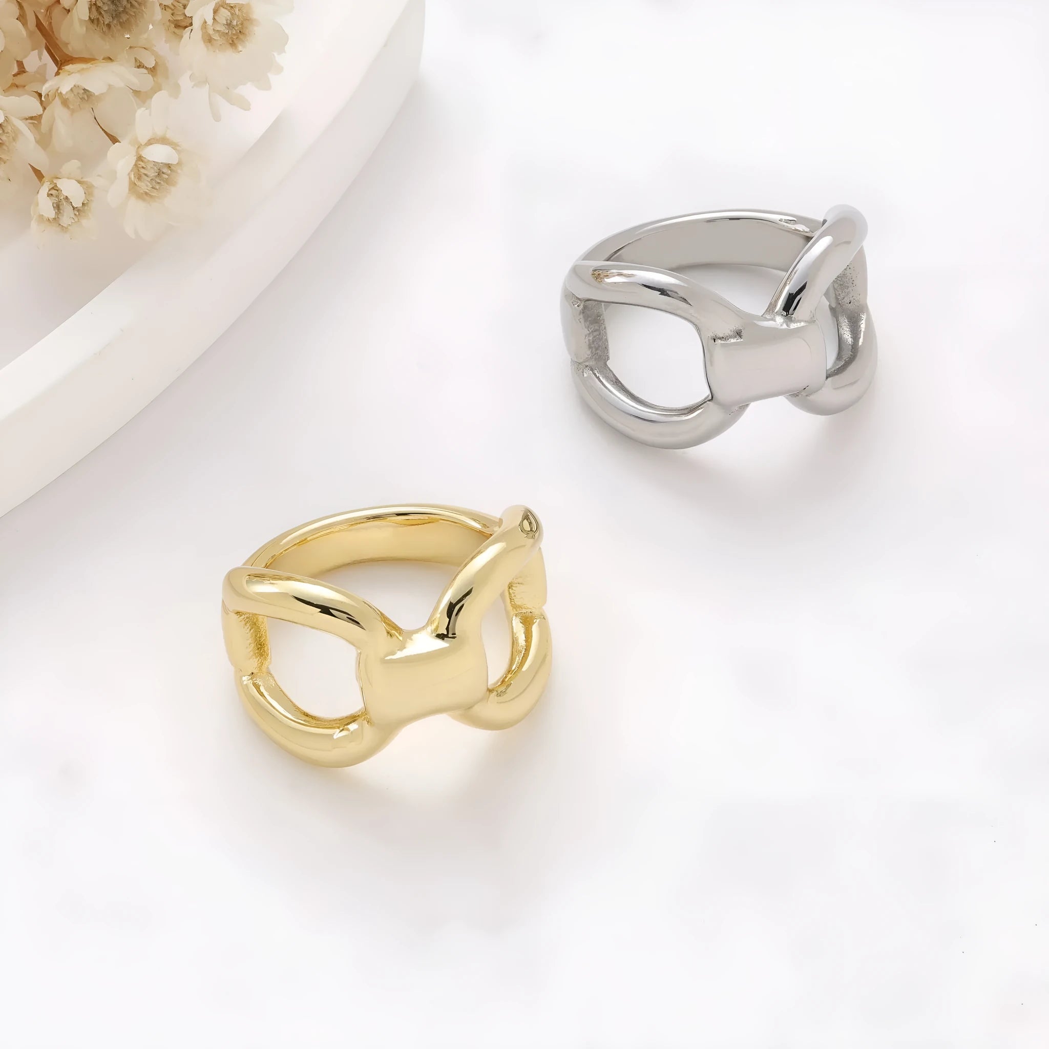 Women's butterfly bow hollow ring in titanium steel with geometric cut-outs, gold and steel colour options