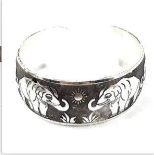 Open carved Miao ethnic bracelet with Roman shape in alloy material showing turtle design