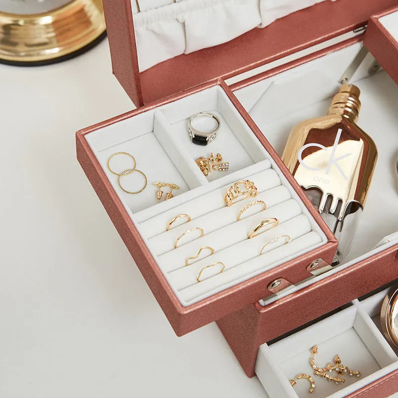 PU leather hard-shell jewellery storage box in rose gold colour