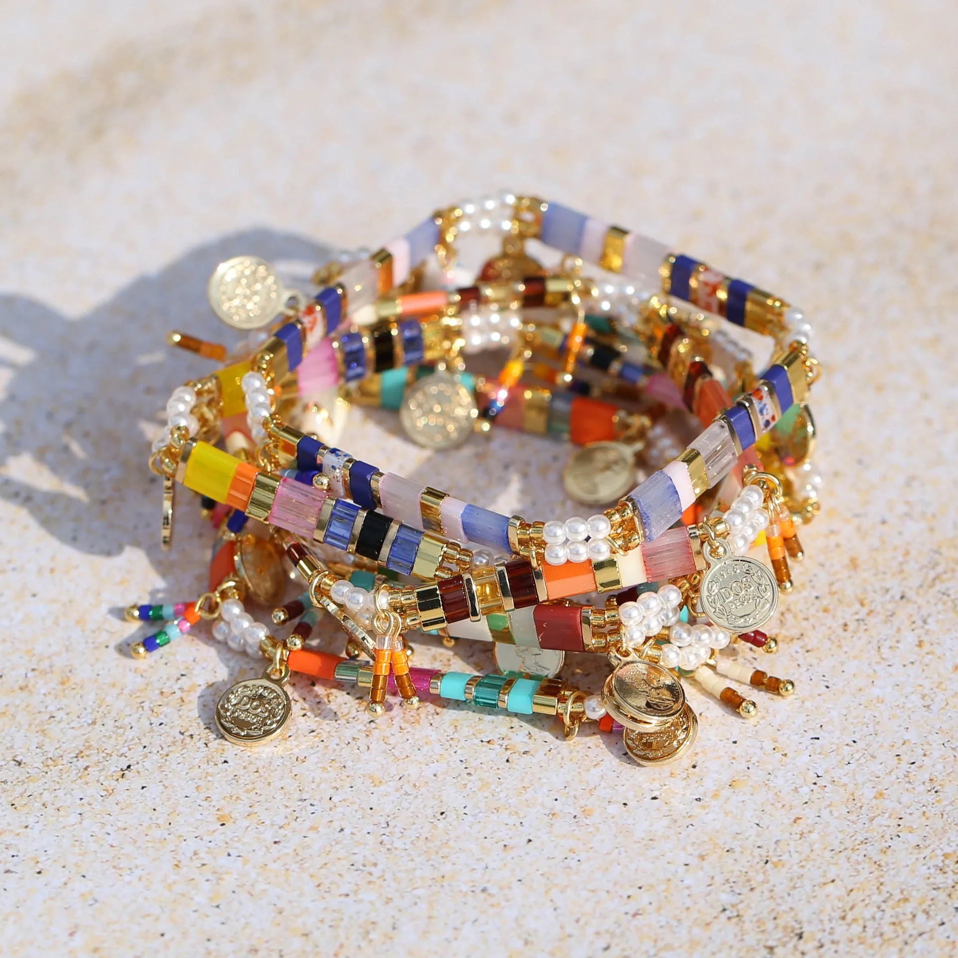 Women's handmade imitation pearl beaded bracelet with adjustable clasp in a choice of six colours.