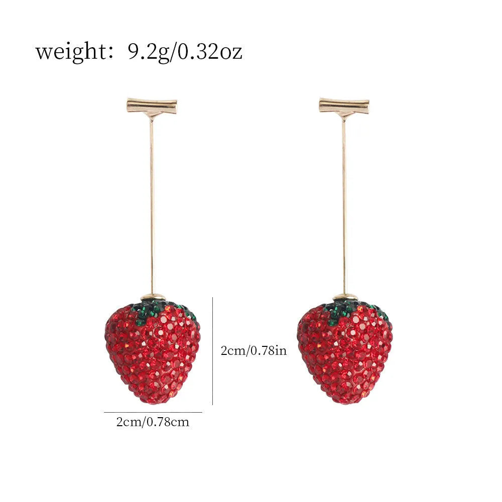 Red geometric strawberry-shaped dangle earrings with spot drill texture on zinc alloy.