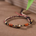 Hand woven DIY watch bracelet with lapis lazuli coloured rope and flexible wire in an ethnic style.