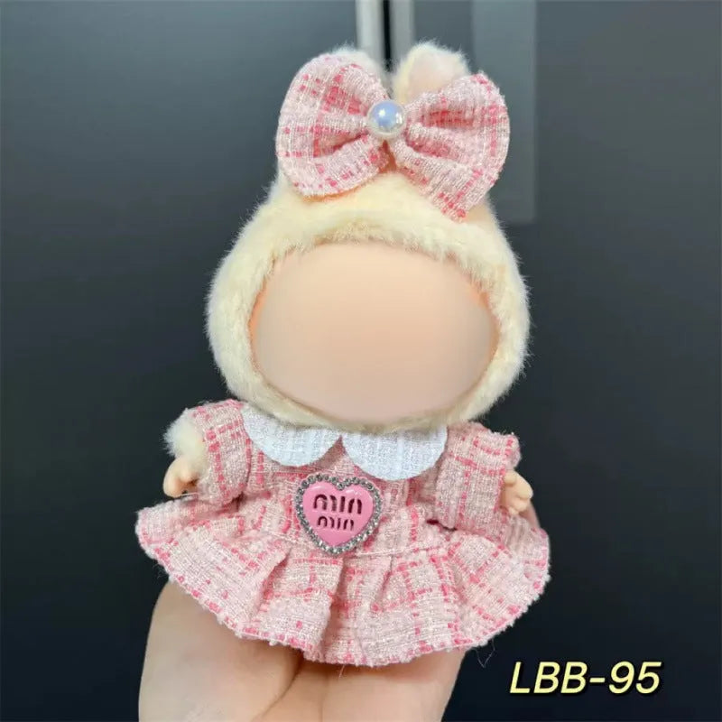 Plastic doll clothes costume for a 17cm tall vinyl figurine on a white background.