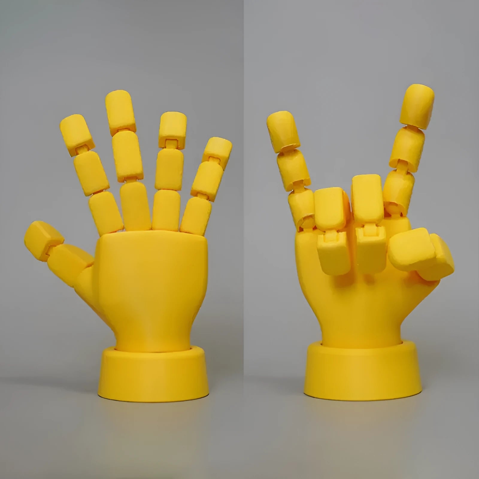 Yellow movable joint hand prop ornament on a white background.