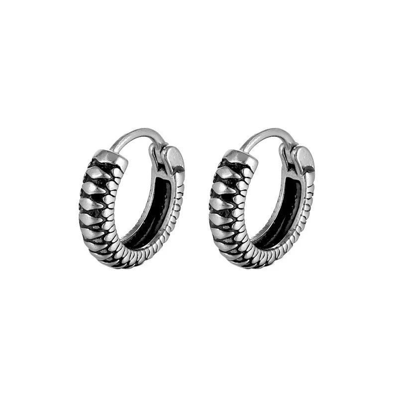 Silver geometric retro twist earrings made from stainless steel with a striped pattern.