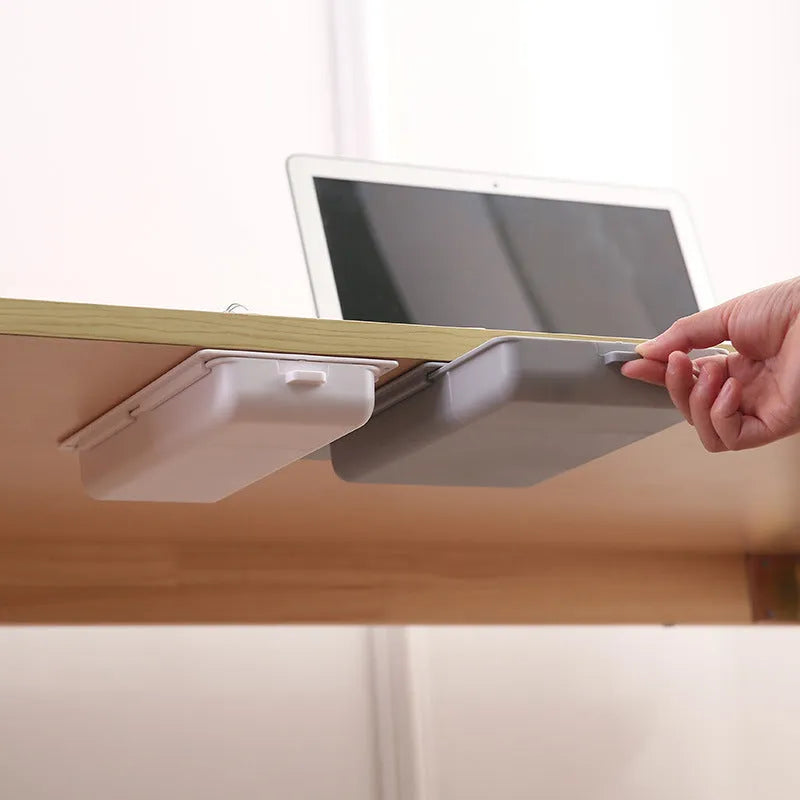 Plastic self-adhesive under desk storage drawer organiser box with grid lid in white, grey, yellow, or orange.