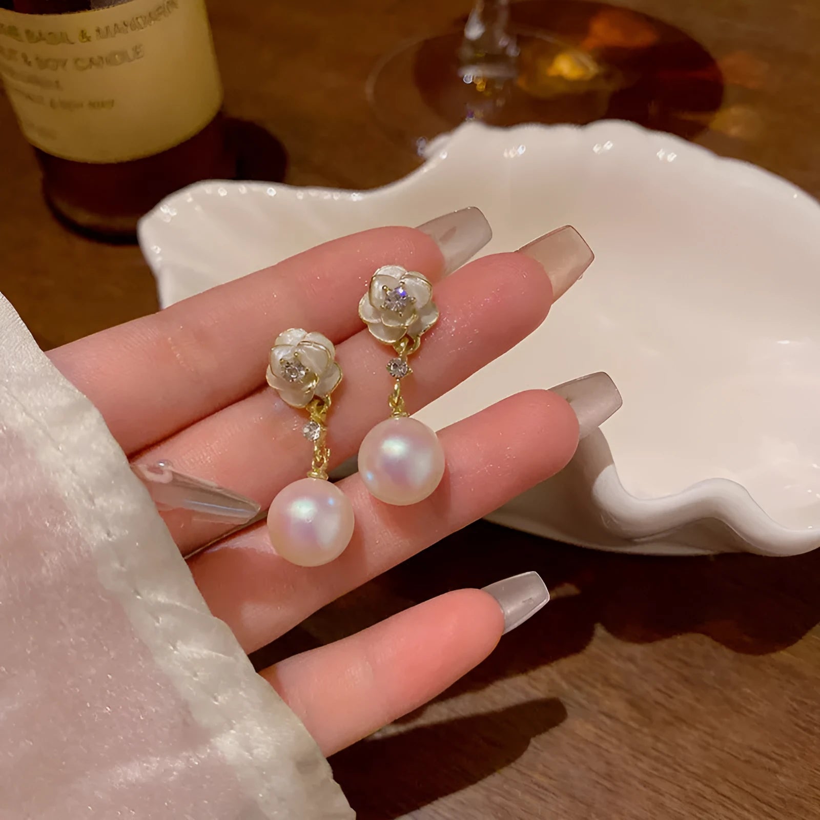 Camellia flower stud earrings with pearl centrepiece on alloy backing