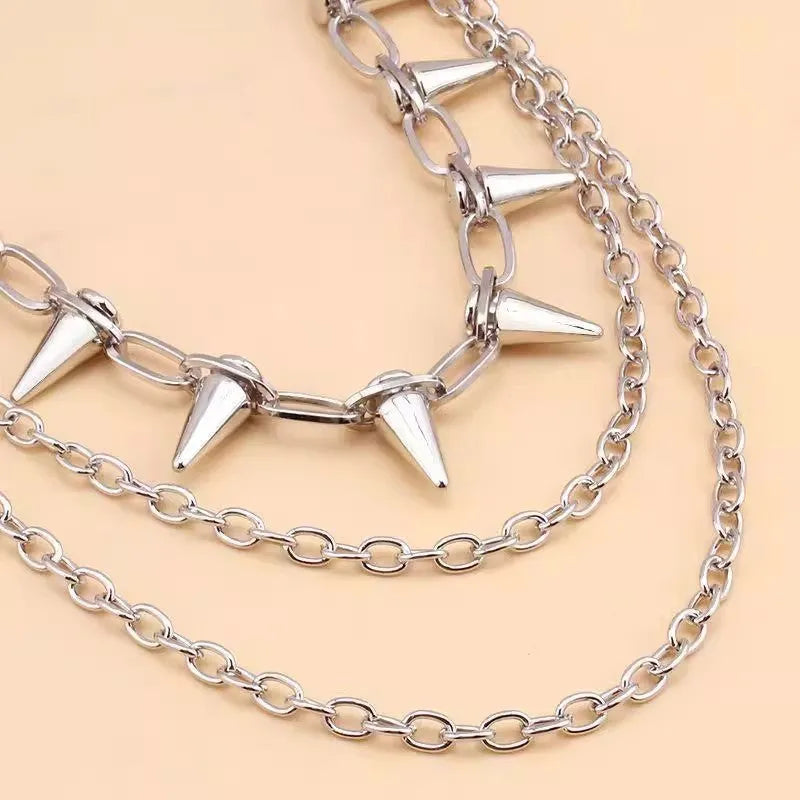 Silver metal trousers chain with double layers, zipper detail and rivet accents on 115cm adjustable chain