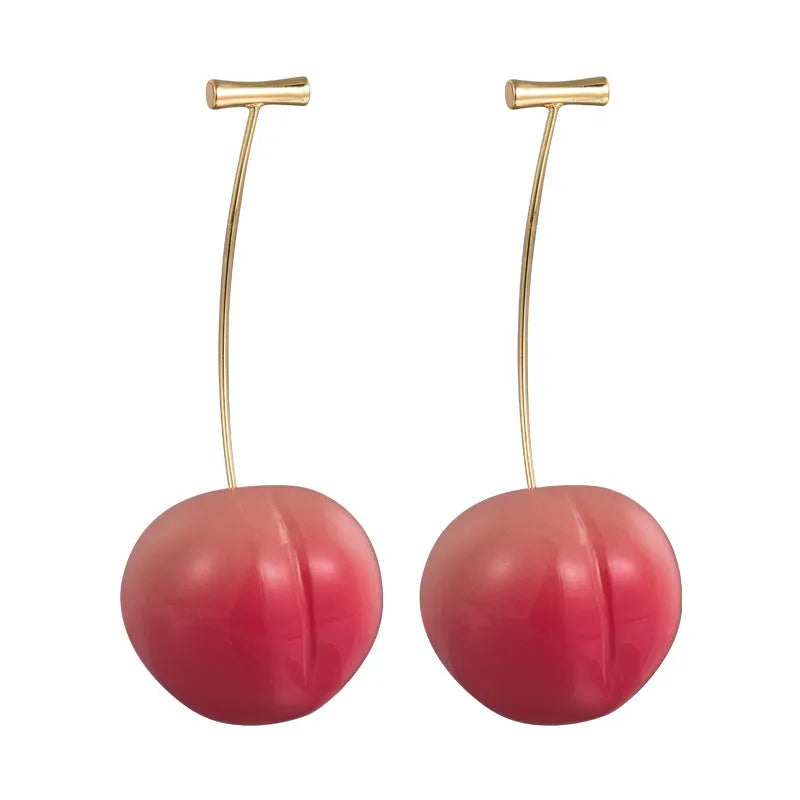 A pair of peach-shaped acrylic earrings on copper posts, shown in small and large size variants.