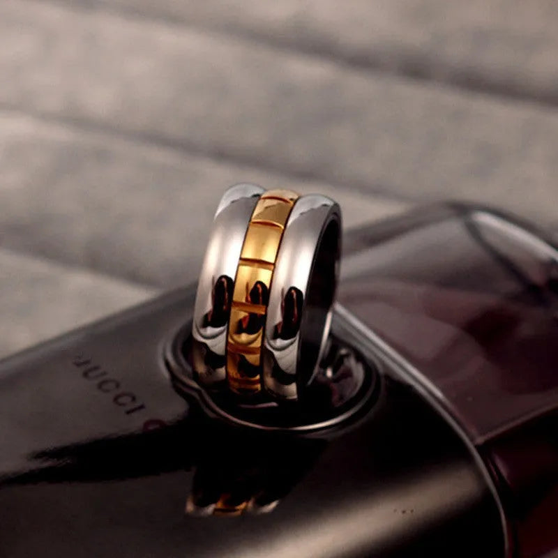 Gold titanium steel knuckle ring with ultra-wide tail and rotatable design