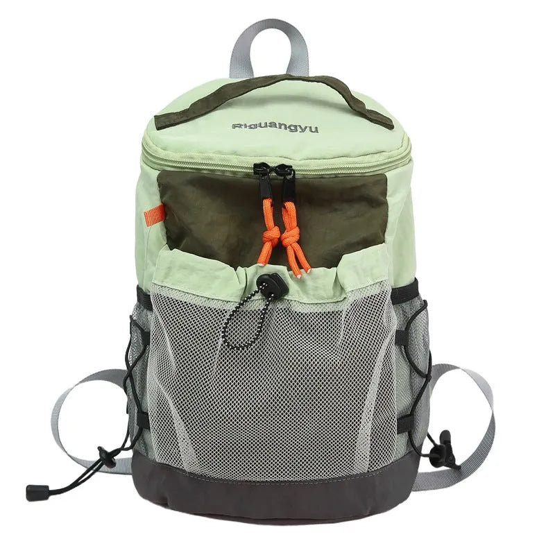 Japanese style casual backpack in lightweight nylon, showing curved shoulder straps and solid colour options.