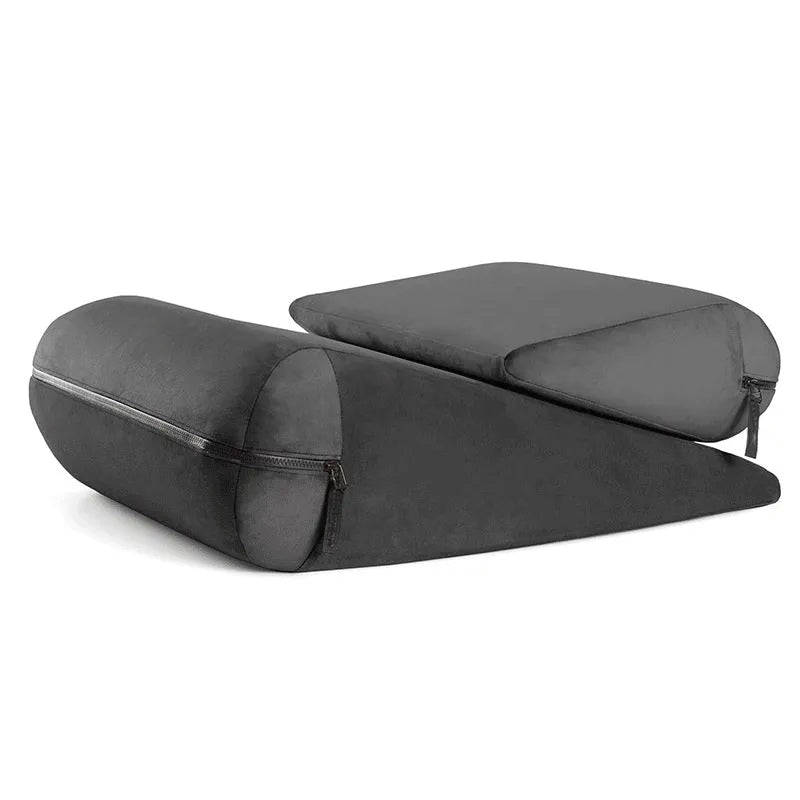 High density sponge triangular support pillow in various colours on a sofa.