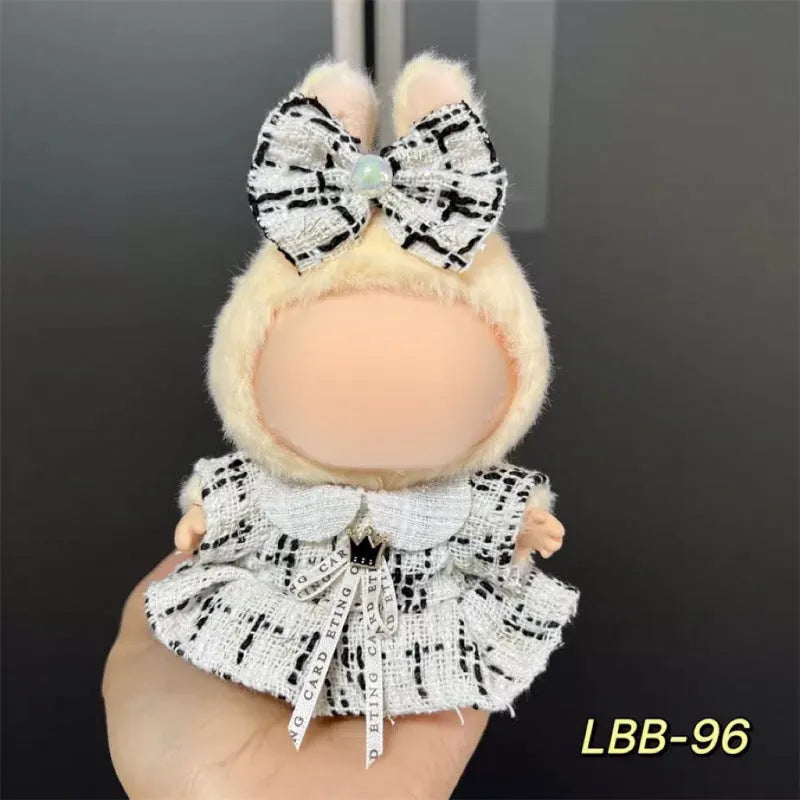 Plastic doll clothes costume for a 17cm tall vinyl figurine on a white background.