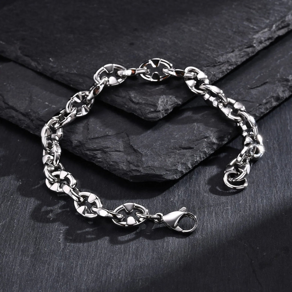 Men's thick handmade stainless steel chain bracelet with geometric links in steel colour.
