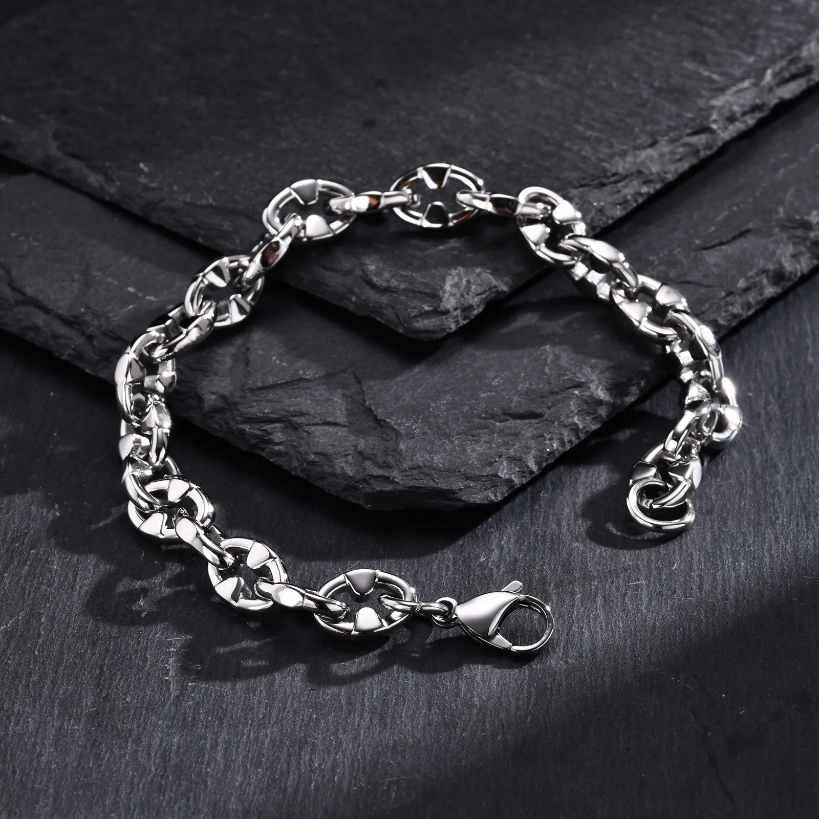 Men's thick handmade stainless steel chain bracelet with geometric links in steel colour.
