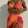 Women's orange and purple gradient three-piece swimsuit with adjustable loop buckle design