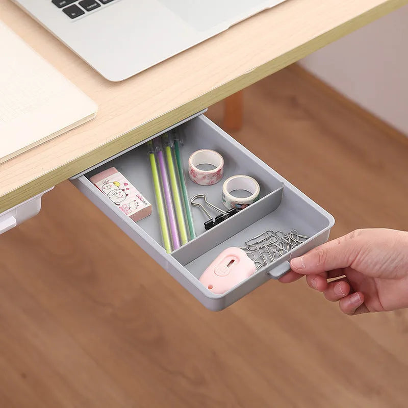 Plastic self-adhesive under desk storage drawer organiser box with grid lid in white, grey, yellow, or orange.