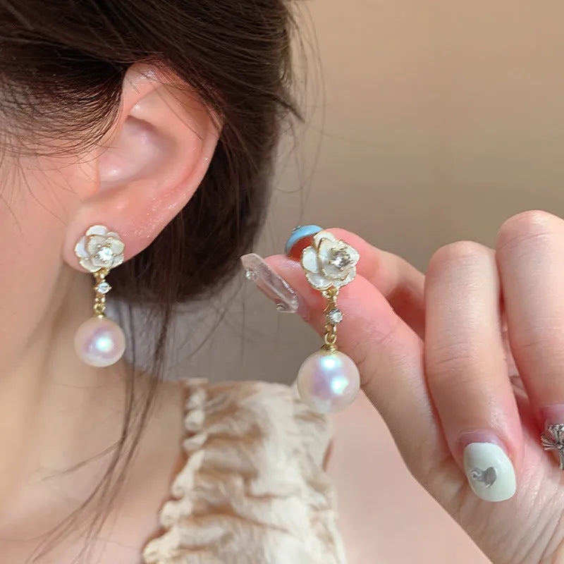 Camellia flower stud earrings with pearl centrepiece on alloy backing