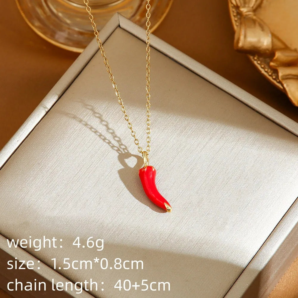 Delicate indie cherry strawberry pepper necklace on a titanium steel O-ring chain