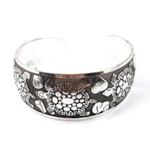 Open carved Miao ethnic bracelet with Roman shape in alloy material showing turtle design