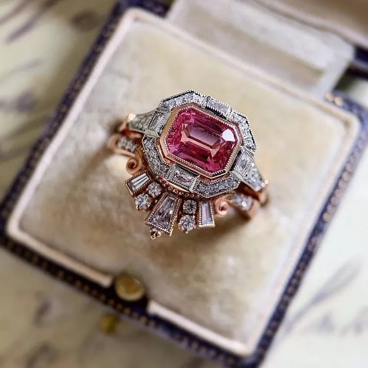 Rose gold alloy women's fashion ring with geometric shape and gemstones in a retro style.
