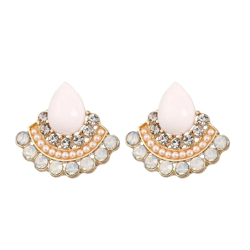 Retro fan-shaped silver colour alloy earrings with rhinestone and opal decorative details.