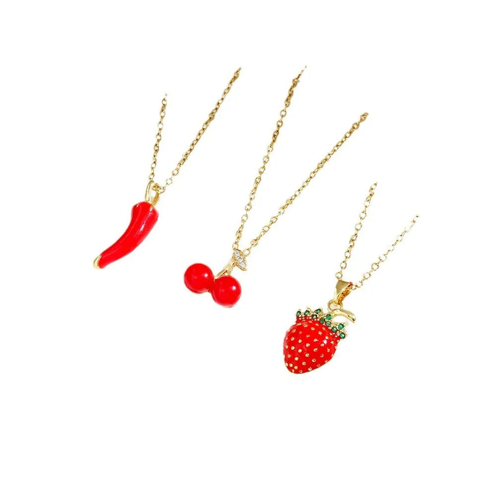 Delicate indie cherry strawberry pepper necklace on a titanium steel O-ring chain