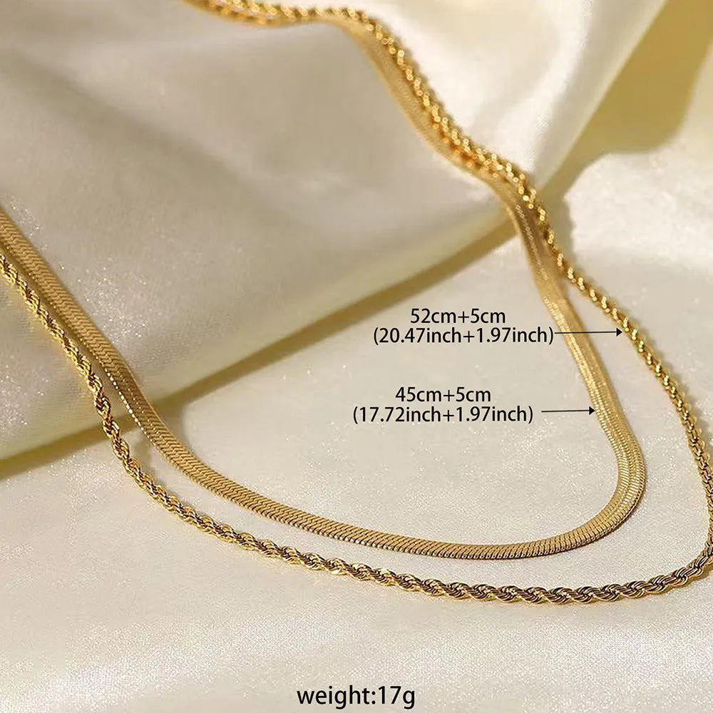 Close-up of a women's gold retro double-layer twist necklace with a geometric pendant on an adjustable chain.