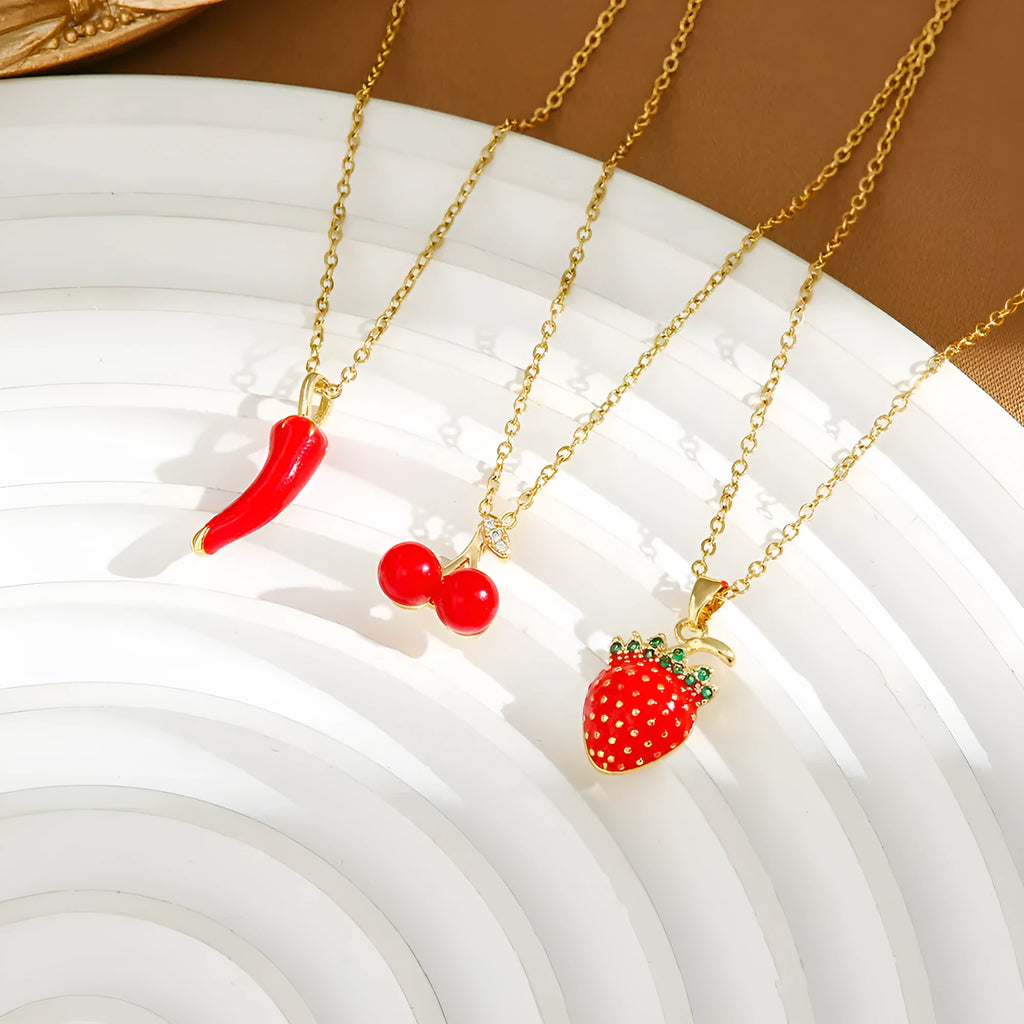 Delicate indie cherry strawberry pepper necklace on a titanium steel O-ring chain