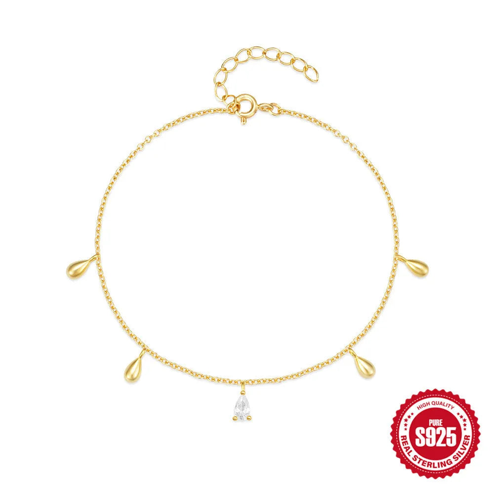 Gold S925 sterling silver bracelet with water drop diamond pendant on a geometric chain.