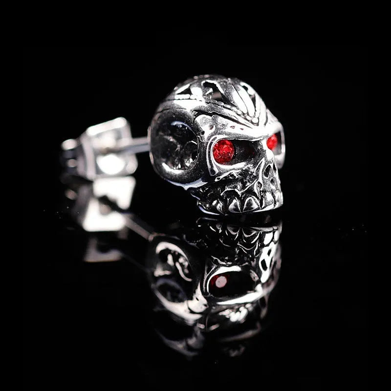 Retro skull stud earrings with red eye ghost head design and gemstone inlays on alloy base