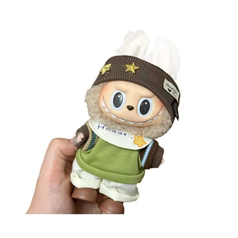 Plastic doll clothes costume for a 17cm tall vinyl figurine on a white background.