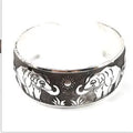 Open carved Miao ethnic bracelet with Roman shape in alloy material showing turtle design