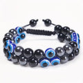 Natural green and gold lapis lazuli stone bracelet with a Chinese retro design on a wrist.