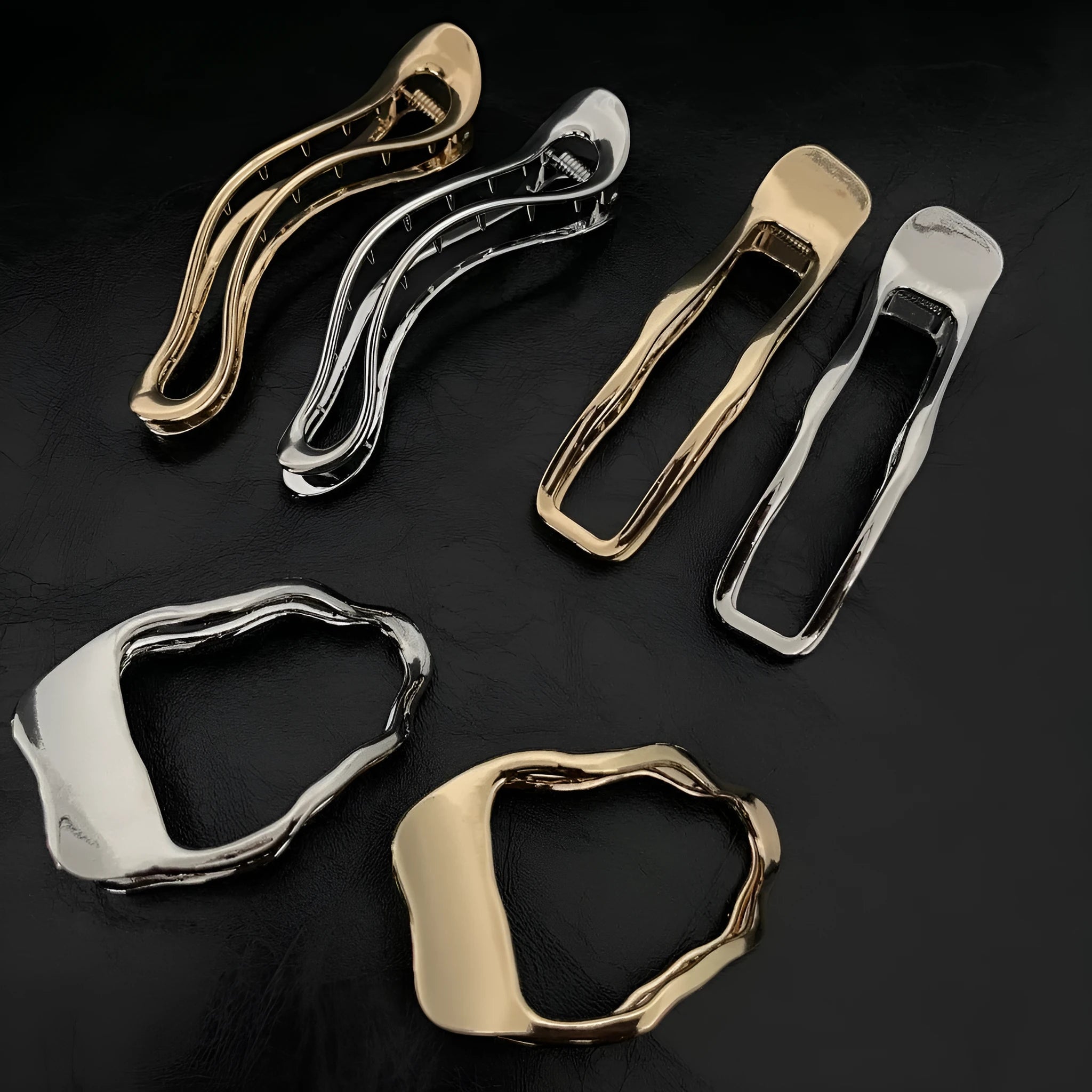 Women's fashion barrettes in zinc alloy with gold and silver finishes showing arc, square, and triangle shapes