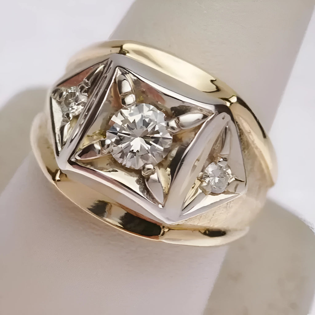 Gold-coloured geometric hollow copper couple ring with wide face and chamfered square pattern.